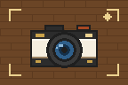 Pixel drawing of a camera inside brass viewfinder corners, on a brick wall